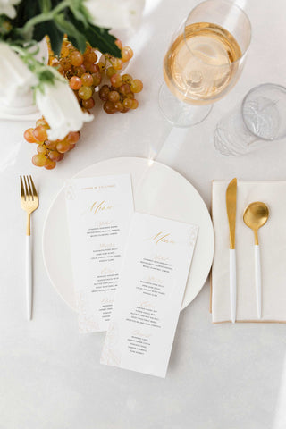 Tropical wedding dinner menus inspired on the Wedding Decor with linear drawings of Orchids and Monstera Leaves
