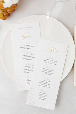 Tropical wedding dinner menus inspired on the Wedding Decor with linear drawings of Orchids and Monstera Leaves
