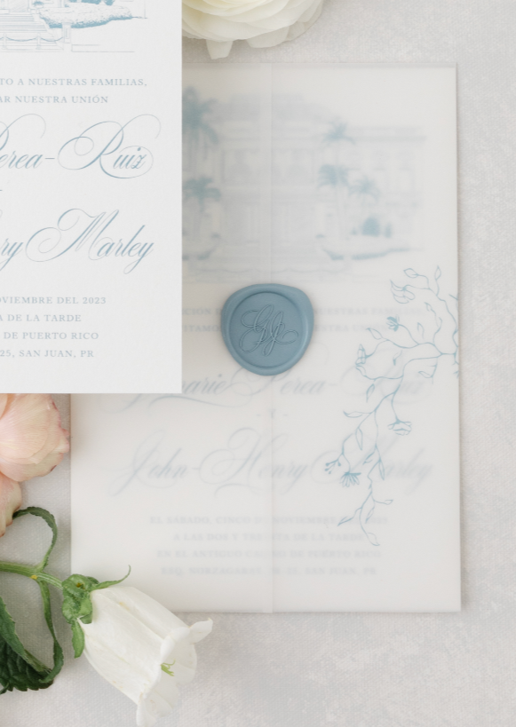 Wedding Invitation with a Wax Seal containing the couple's monogram